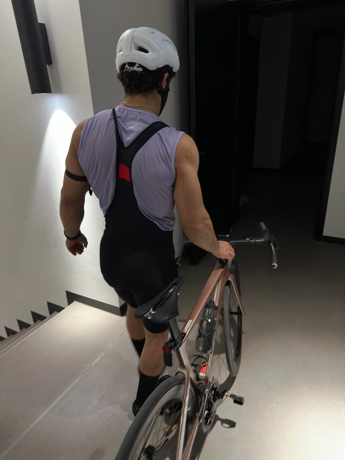 Walking the road bike through a stairwell in Berlin.