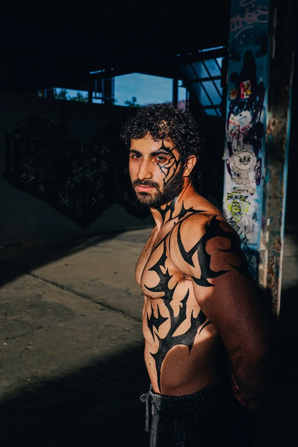 Body-paint editorial shot on the street.